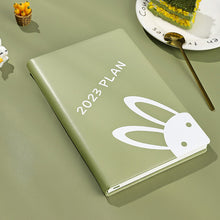 Load image into Gallery viewer, Playful Bunny 2023 (A5) Leather Planners (4 Colors)
