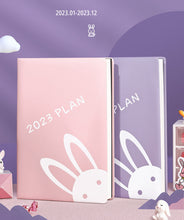 Load image into Gallery viewer, Playful Bunny 2023 (A5) Leather Planners (4 Colors)