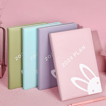 Load image into Gallery viewer, Playful Bunny 2023 (A5) Leather Planners (4 Colors)