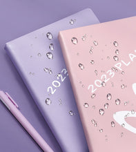 Load image into Gallery viewer, Playful Bunny 2023 (A5) Leather Planners (4 Colors)