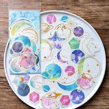 Load image into Gallery viewer, Exotic Universe Gold foiled Stickers (6 Types)