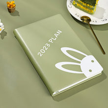 Load image into Gallery viewer, Playful Bunny 2023 (A5) Leather Planners (4 Colors)
